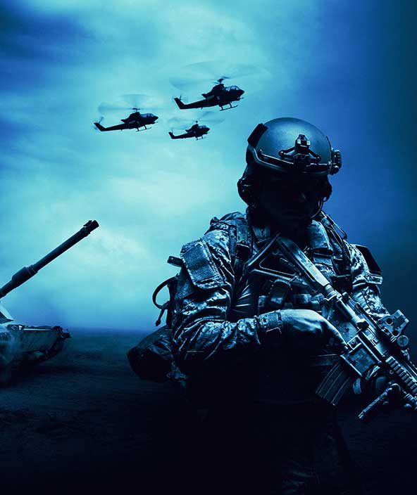 A soldier on the battlefield with aircraft in the background